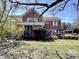 Rear exterior view with patio and brick design elements at 7180 N State Road 42, Eminence, IN 46125