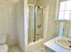 Bathroom featuring white tiles, a shower and toilet at 7180 N State Road 42, Eminence, IN 46125