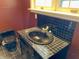 Bathroom features a unique sink and tile work at 7180 N State Road 42, Eminence, IN 46125