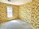 Small bedroom features wallpaper and window with natural light at 7180 N State Road 42, Eminence, IN 46125