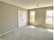 Bedroom featuring carpeted floors, natural lighting and neutral paint at 7180 N State Road 42, Eminence, IN 46125