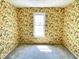 View of a bedroom with wallpaper and window bringing in natural light at 7180 N State Road 42, Eminence, IN 46125