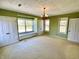 Bright bedroom with closet, natural light, and hardwood floors at 7180 N State Road 42, Eminence, IN 46125