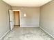 Empty bedroom featuring carpeted floors and neutral paint at 7180 N State Road 42, Eminence, IN 46125