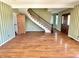 Grand entryway with staircase and hardwood floors, perfect for greeting guests at 7180 N State Road 42, Eminence, IN 46125
