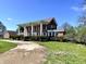 Classic brick home with prominent white columns and traditional design at 7180 N State Road 42, Eminence, IN 46125