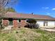 Brick garage with multiple doors and a side entry at 7180 N State Road 42, Eminence, IN 46125