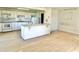 Bright kitchen featuring white appliances, cabinets, and a breakfast bar perfect for quick meals at 7180 N State Road 42, Eminence, IN 46125
