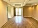 Spacious living room with hardwood flooring, double doors and coffered ceiling at 7180 N State Road 42, Eminence, IN 46125