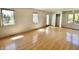 Bright and spacious room with hardwood floors, multiple windows, and a closet at 7180 N State Road 42, Eminence, IN 46125
