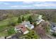 A high-angle shot captures this residential neighborhood near the golf course, showcasing various homes and their layouts at 797 Crossbridge Ct, Avon, IN 46123