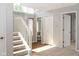 Hallway with view into bathroom and staircase at 797 Crossbridge Ct, Avon, IN 46123