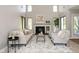 Bright living room with a fireplace, high ceilings, and a comfortable seating area at 797 Crossbridge Ct, Avon, IN 46123