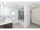 Bathroom features a double vanity, mosaic tile accents, and a glass-enclosed shower at 836 Grassy Branch Dr, Indianapolis, IN 46239