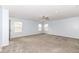 Large bedroom with a ceiling fan, carpeted floor, and windows to let in natural light at 836 Grassy Branch Dr, Indianapolis, IN 46239