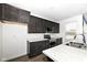 Kitchen showcasing modern fixtures, appliances, and marbled countertops at 836 Grassy Branch Dr, Indianapolis, IN 46239