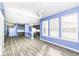 Open living space with dark cabinets and modern lighting fixtures at 836 Grassy Branch Dr, Indianapolis, IN 46239