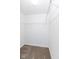 Cozy carpeted walk-in closet featuring white walls and a metal shelving unit at 836 Grassy Branch Dr, Indianapolis, IN 46239