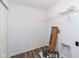 Walk-in closet with modern white wire shelving system and laminate flooring at 836 Grassy Branch Dr, Indianapolis, IN 46239