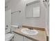 Bathroom with a white vanity, mirror, and combined tub and shower at 8808 Hosta Way, Indianapolis, IN 46113