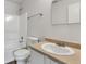 Well-lit bathroom featuring a combined tub and shower at 8808 Hosta Way, Indianapolis, IN 46113