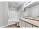 Clean bathroom featuring a bathtub, shower, and updated vanity at 8808 Hosta Way, Indianapolis, IN 46113