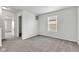 Cozy bedroom featuring soft carpeting and a bright window at 8808 Hosta Way, Indianapolis, IN 46113