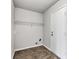 Walk-in closet with vinyl tile flooring and white walls at 8808 Hosta Way, Indianapolis, IN 46113