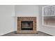 Close up of the brick fireplace at 8808 Hosta Way, Indianapolis, IN 46113