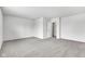 Bright, open living room with neutral walls and plush carpeting at 8808 Hosta Way, Indianapolis, IN 46113
