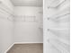 Spacious walk-in closet with installed shelving providing ample storage space at 8808 Hosta Way, Indianapolis, IN 46113