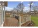 Backyard featuring a wood patio with a grill and comfortable seating, perfect for entertaining at 894 Woodgate Ln, Greenwood, IN 46143