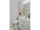 Cozy bathroom with a decorative mirror, pedestal sink, and decorative accents adding a touch of charm at 894 Woodgate Ln, Greenwood, IN 46143