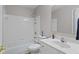 Well-maintained bathroom features a shower, bathtub, and a vanity sink for a functional space at 894 Woodgate Ln, Greenwood, IN 46143
