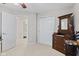 Bedroom boasts a closet, paneled doors, and warm-toned walls creating a cozy and inviting atmosphere at 894 Woodgate Ln, Greenwood, IN 46143