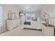 Bedroom featuring a large bed, neutral walls, tv, and side tables creating a cozy and inviting retreat at 894 Woodgate Ln, Greenwood, IN 46143