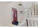 Welcoming entryway featuring a stylish front door, staircase, and neutral decor at 894 Woodgate Ln, Greenwood, IN 46143