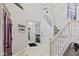 Spacious entryway with a staircase, tile flooring, and views into other living spaces at 894 Woodgate Ln, Greenwood, IN 46143