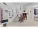 Open concept living space showcases a staircase, hardwood furniture, and adjacent dining area at 894 Woodgate Ln, Greenwood, IN 46143