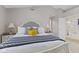Comfortable main bedroom featuring a cozy bed, side tables, and access to the bathroom at 894 Woodgate Ln, Greenwood, IN 46143