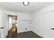 Laundry room with modern amenities like a utility sink, overhead shelving, and updated electrical fixtures, perfect for convenience at 902 N Anderson St, Elwood, IN 46036