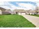 Charming single-Gathering home with well-manicured lawn, driveway and a two-car garage at 9539 Rocky Shore Dr, McCordsville, IN 46055