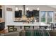 Modern kitchen featuring a large island, sleek cabinetry, and stainless steel appliances at 9539 Rocky Shore Dr, McCordsville, IN 46055