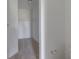Walk-in closet features carpet flooring and wire shelving, providing easy access to storage off the bathroom at 1023 Grassy Br Dr, Indianapolis, IN 46239