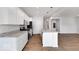Beautiful kitchen with white cabinets, granite countertops, stainless steel appliances, and an island at 1023 Grassy Br Dr, Indianapolis, IN 46239
