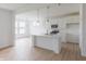 Well-equipped kitchen island and stainless steel appliances are a chef's delight at 1023 Grassy Br Dr, Indianapolis, IN 46239