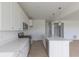 Modern kitchen with stone countertops, island, and stainless steel appliances at 1023 Grassy Br Dr, Indianapolis, IN 46239