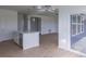 Stylish kitchen island with stainless steel dishwasher and open view to the rest of the home at 1023 Grassy Br Dr, Indianapolis, IN 46239