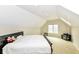 A cozy bedroom with natural light from the windows at 10844 Fairwoods Dr, Fishers, IN 46037
