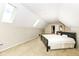 Attic bedroom with multiple skylights and a queen-sized bed offers a cozy and private retreat at 10844 Fairwoods Dr, Fishers, IN 46037